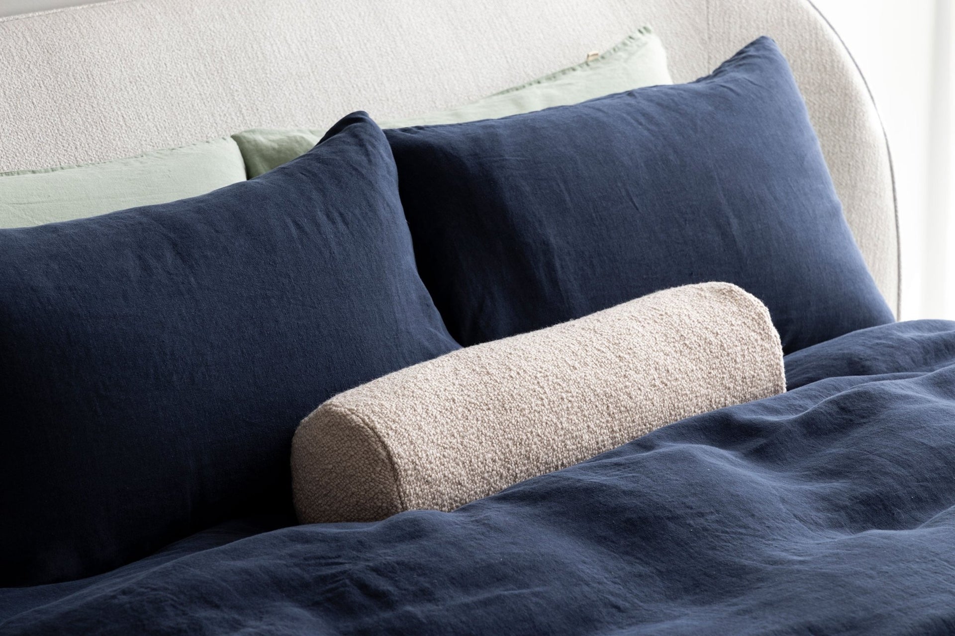 Shop Poppy Bolster Cushion Oat by Jardan